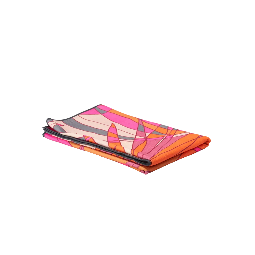 Owala folded towel in Tropic Like It's Hot, pink, orange, magenta, and beige abstract print