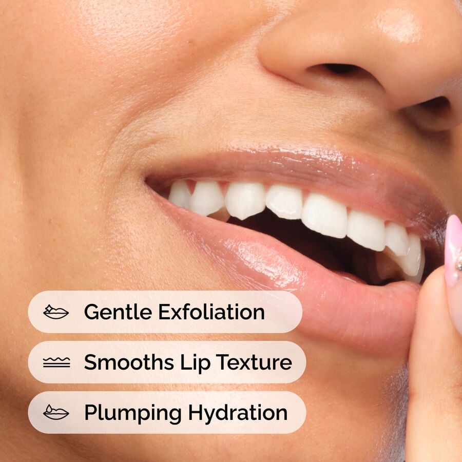 Model applying PHA 5% Lip Exfoliating Serum to their lips 